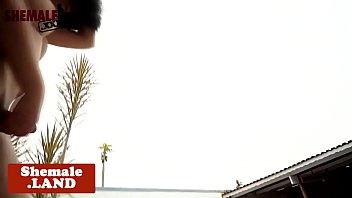 Teasing trans wanks off her cock outdoors